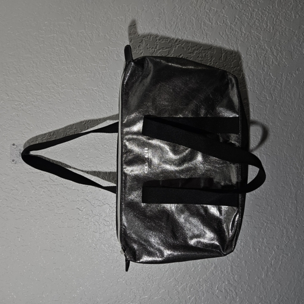 Coach Sleek Silver and Black Duffel Bag with Glossy Finish
